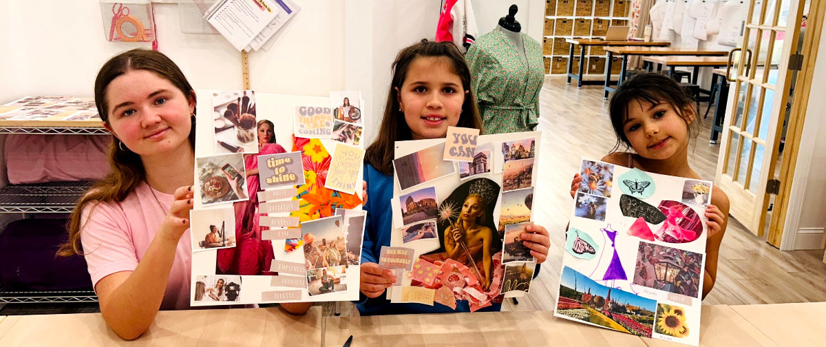 Three children holding up their artwork in a classroom setting.